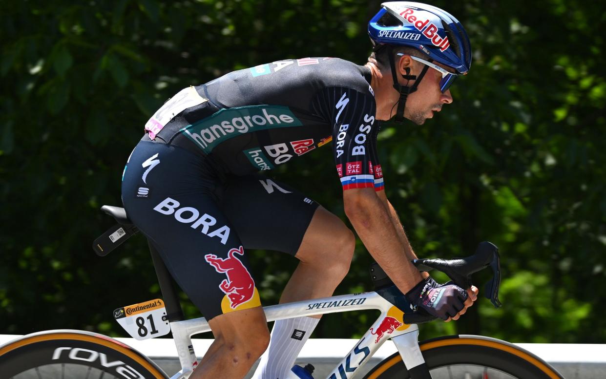 Primoz Roglic riding during stage four