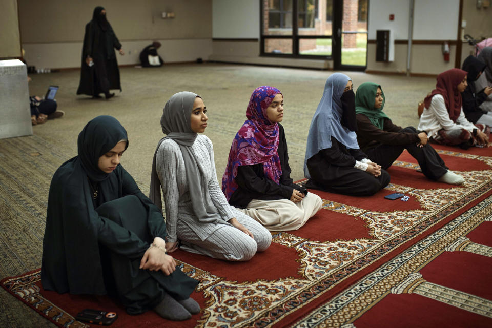 Muslim Rutgers University's students prepare pray on Friday, Oct. 27, 2023, in New Brunswick, N.J.For many of the university chaplains and faith leaders caring for students angered and shaken by the Israel-Hamas war, the needs are acute, the days intense. The bloodshed has roiled campuses in the United States, sparking rival rallies and competing demands.(AP Photo/Andres Kudacki)