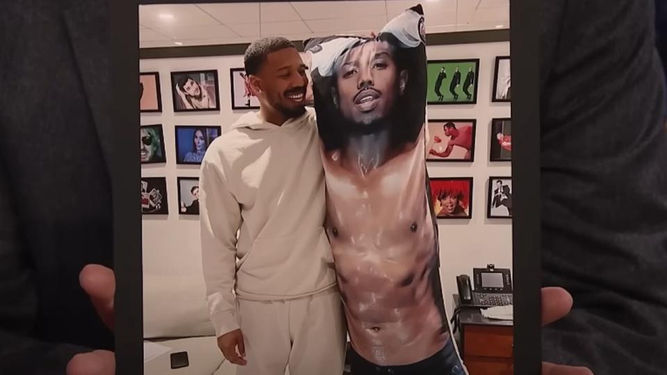 Michael B. Jordan posing with his pillow counterpart at the SNL offices