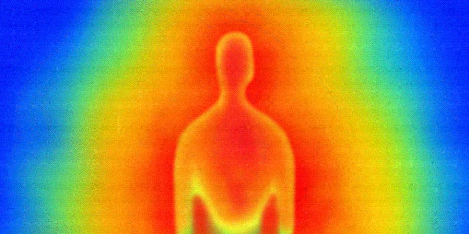 An illustrated gif of a human figure in red, orange and yellow tones mimicking thermal imaging. The background is animated to have the colors appear to radiate heat.