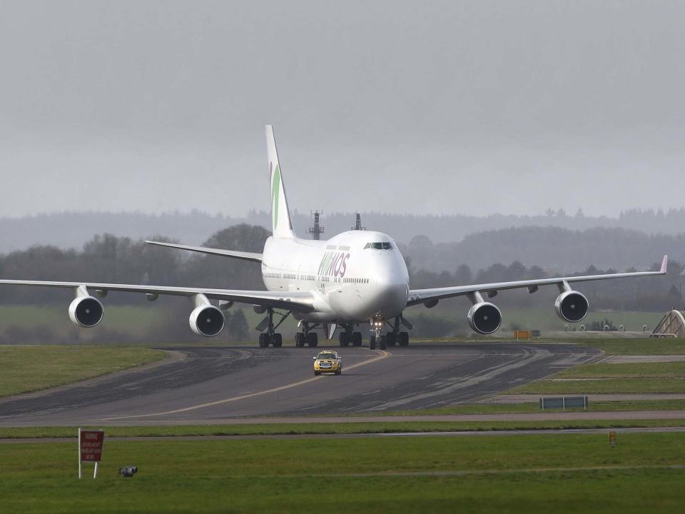 An aircraft repatriating British people to the UK from a cruise ship hit by the coronavirus in Yokohama, Japan, arrives at RAF Boscombe Down in Wiltshire: PA