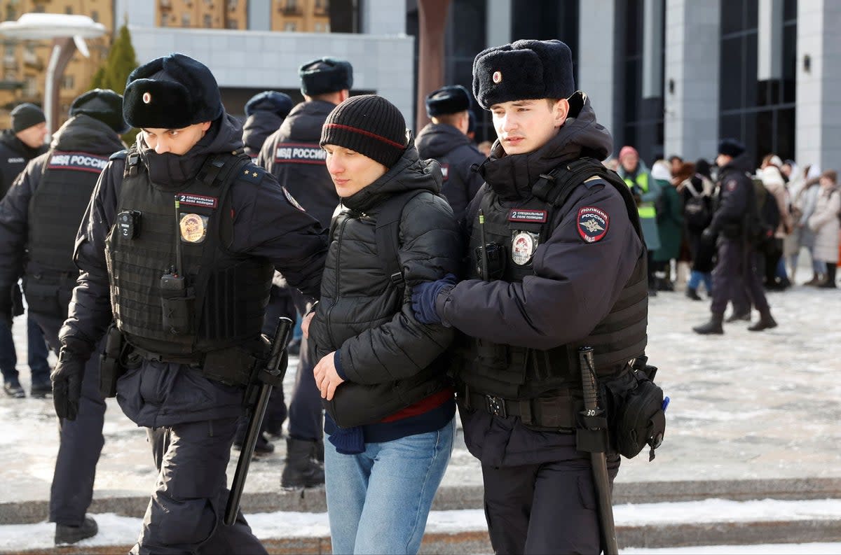 Police officers detaining a 'Way Home' demonstration  (REUTERS)