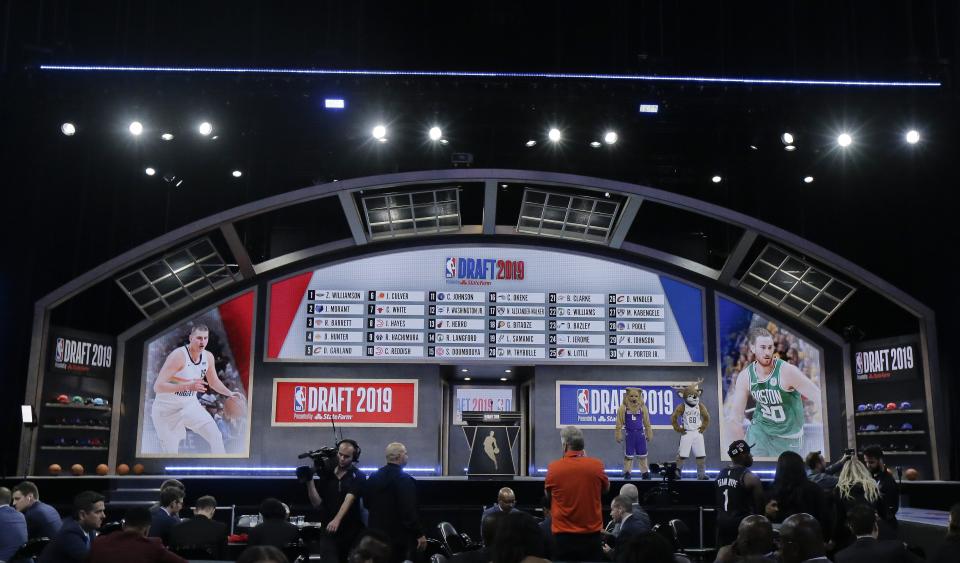 The draft board displays the picks for the first round in the NBA basketball draft Thursday, June 20, 2019, in New York. (AP Photo/Julio Cortez)