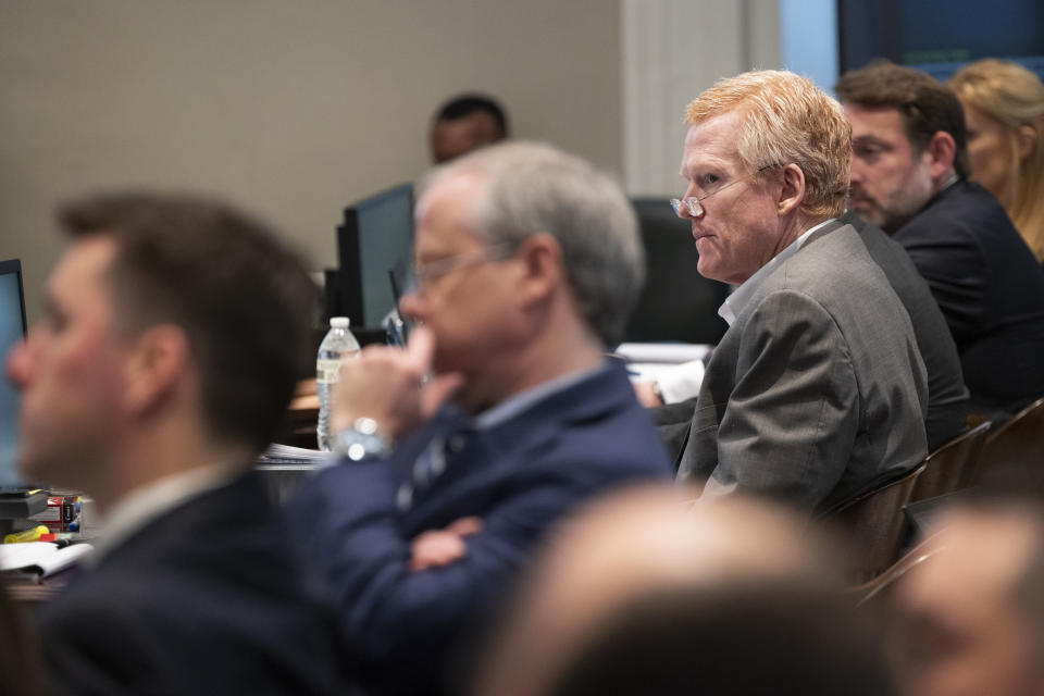 Alex Murdaugh, right, listens to forensic evidence of his, his wife and son's cell phones during his trial for murder at the Colleton County Courthouse in Walterboro, S.C., on Wednesday, Feb. 1, 2023. (Joshua Boucher/The State via AP, Pool)