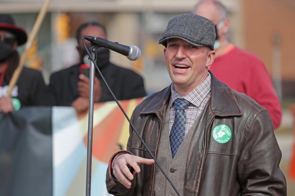 Andy Berg, a Kenosha County supervisor and one of the members of the Racial and Ethnic Equity Commission, speaks during a rally.