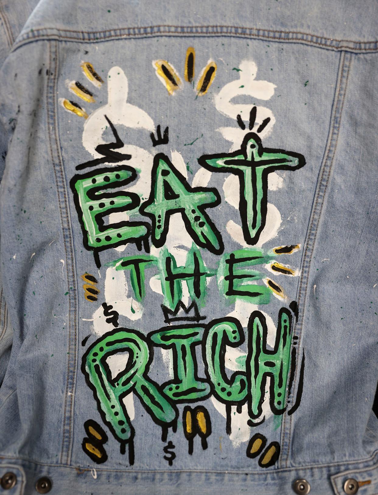 A painted jacket created by Jonezy is for sale at Capitol Consignment in downtown Salem on April 16.