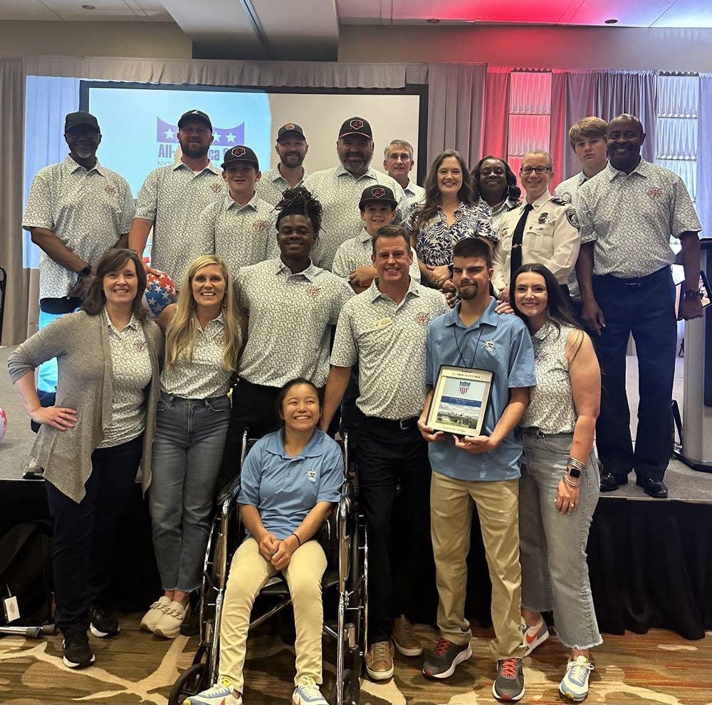 The delegation from Watkinsville that traveled to Denver, Colorado, posed for photos after winning an All-American City award.