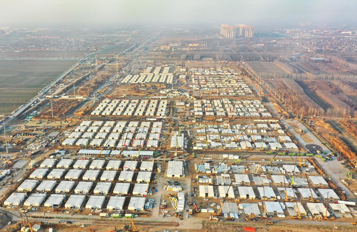 SHIJIAZHUANG, Jan. 18, 2021 -- Aerial photo taken on Jan. 18, 2021 shows the Huangzhuang apartment COVID-19 quarantine center under construction in Shijiazhuang, north China's Hebei Province.   Construction of the main structures of the Huangzhuang apartment COVID-19 quarantine center in Shijiazhuang is nearing the end. With a total floor area of 34 hectares, the facility will house close contacts or secondary close contacts of COVID-19 confirmed cases. (Photo by Yang Shiyao/Xinhua via Getty) (Xinhua/Yang Shiyao via Getty Images)