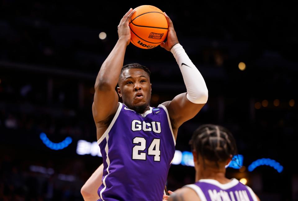 Grand Canyon Antelopes forward Yvan Ouedraogo (24) grabs a rebound during the first half against the Gonzaga Bulldogs at Ball Arena in Denver on March 17, 2023.