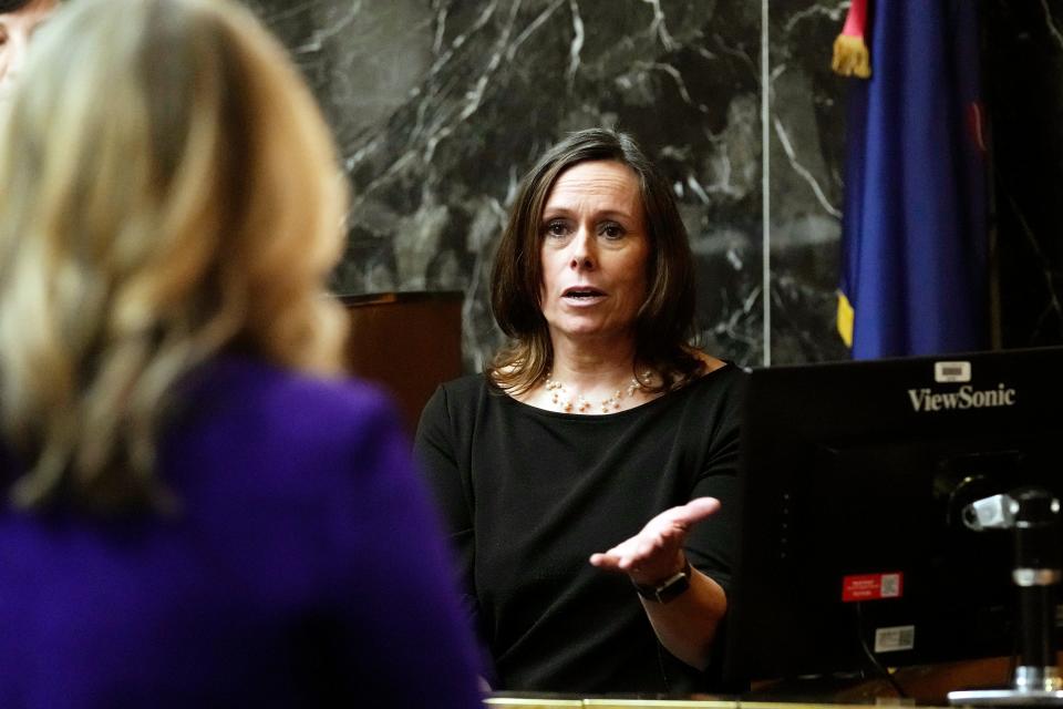 Kristy Gibson-Marshall, assistant principal at Oxford H.S. testifies before Oakland County Prosecutor Karen McDonald in the Oakland County courtroom Friday, March 8, 2024, in Pontiac, Mich. James Crumbley is on trial for involuntary manslaughter. He's accused of contributing to the tragedy at Oxford High School by failing to properly secure a gun used by son Ethan Crumbley. Four students were killed and more were wounded. (AP Photo/Carlos Osorio, Pool)