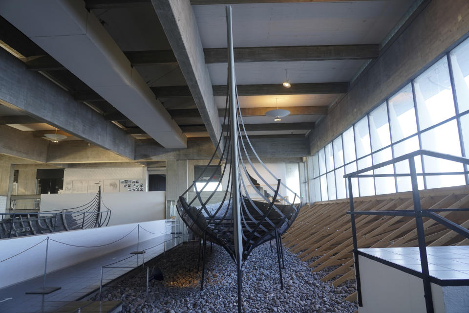 An 11th century, 14-meter Viking coastal trading vessel, sits on display at the Viking Ship Museum. Roskilde, Denmark, Monday, Jan. 17, 2022. For thousands of years, wooden sail boats, best known for having been in use during the Viking-era, allowed the peoples of northern Europe to spread trade, influence and -- in some cases war — across the seas and rivers. In December, UNESCO, the U.N.’s culture agency, added the “clinker’ boat traditions to its list of “Intangible Cultural Heritage,” the result of the first joint nomination from the whole Nordic region.(AP Photo/James Brooks)