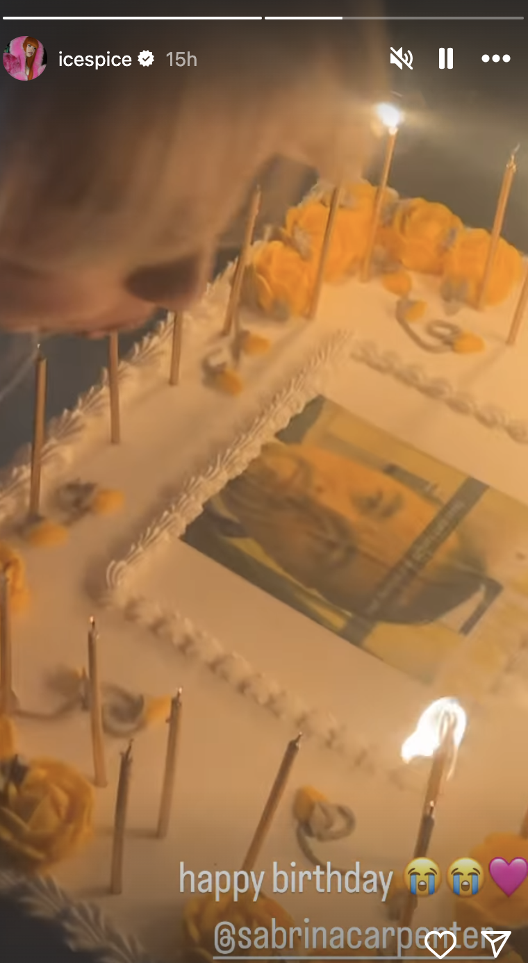 A birthday cake with photo decorations, candles being lit, and a text overlay "happy birthday."