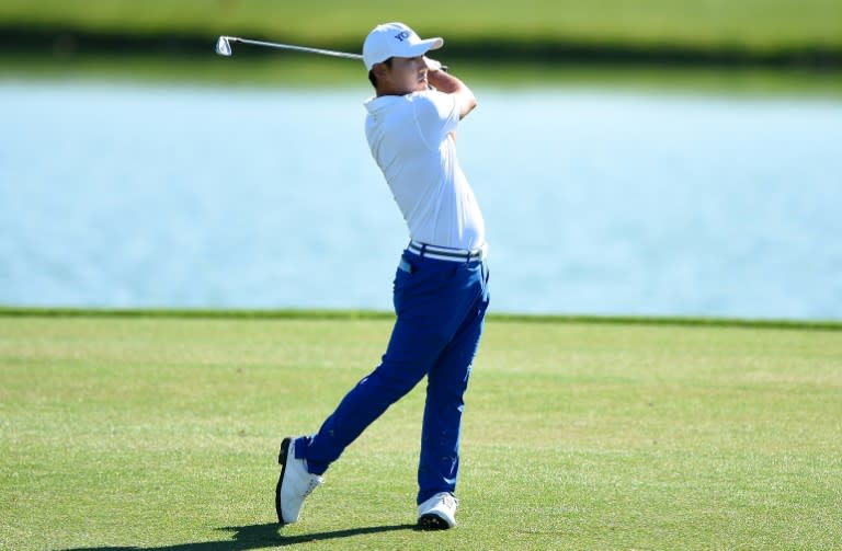 Sung Kang of South Korea plays his second shot from the fairway on the 18th hole during the first round of the Shell Houston Open, in Humble, Texas, on March 30, 2017