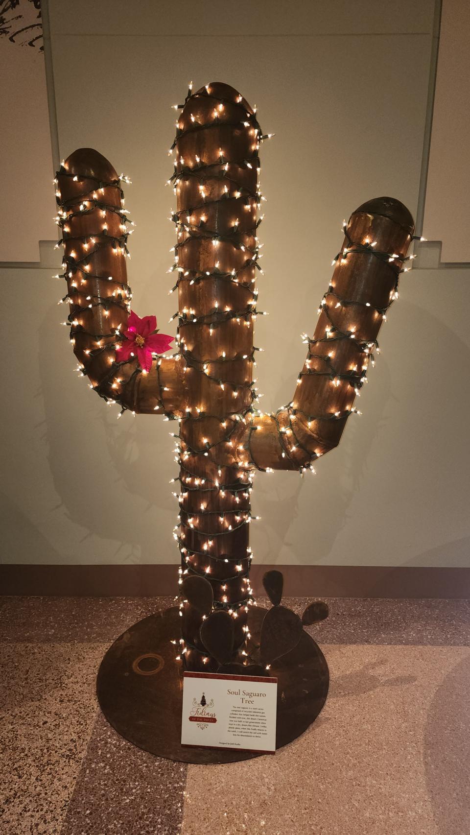 The Soul Saguaro Tree designed by John Kuen was among the many unique Christmas trees auctioned off at the "Tree of Tidings" fundraiser Thursday night at the Panhandle-Plains Historical Museum in Canyon.