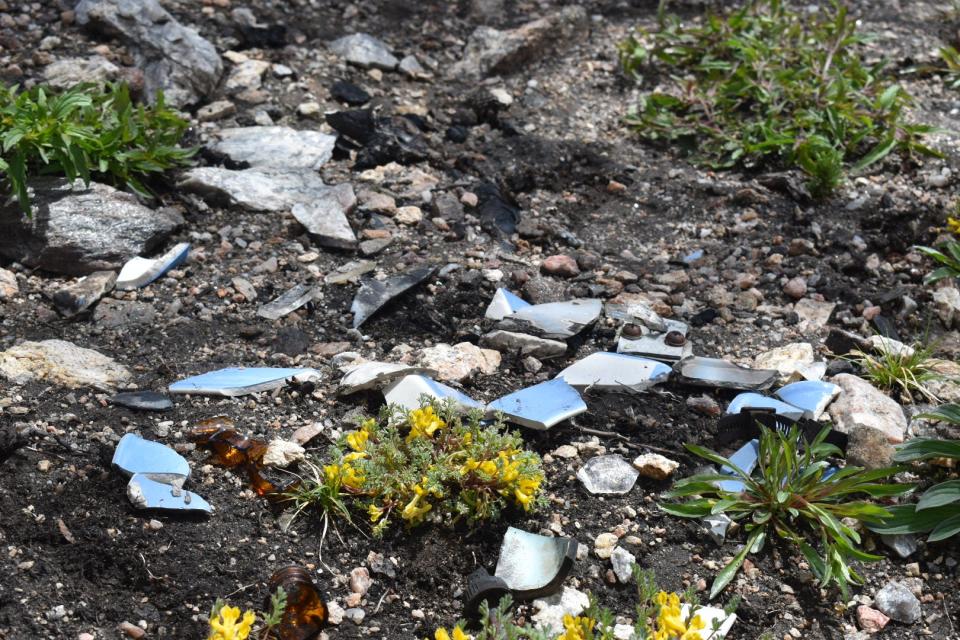 Shards of broken United Airlines crockery sits on the side of Crystal Mountain on June 1. United Flight 610 crashed into the mountainside on June 30, 1951, leaving remnants of the accident that can still be found today by hikers and hobbyist wreck chasers.