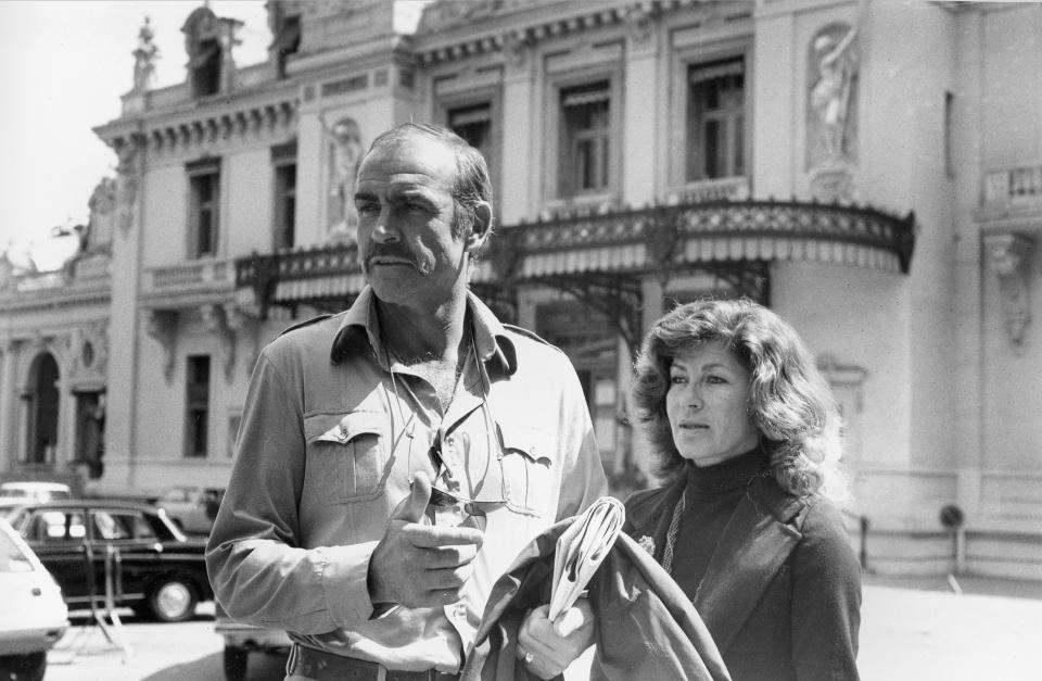 British actor Sean Connery  and his wife, Micheline, are shown in front of the Monte Carlo casino in Monaco, in the South of France, April 27, 1977.  (AP Photo/Rene Maestri)