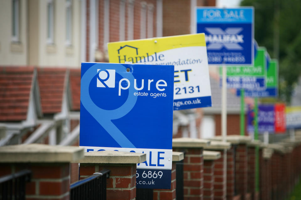 NEWPORT, UNITED KINGDOM - JUNE 12: Estate agent for sale and to let signs are seen outside residential houses, on June 12, 2022 in Newport, England. According to a report from the Royal Institution of Chartered Surveyors (RICS) soaring interest rates and falling prices will mark the end of the UK’s 13-year housing market boom potentially leading to a house price crash. (Photo by Matt Cardy/Getty Images)