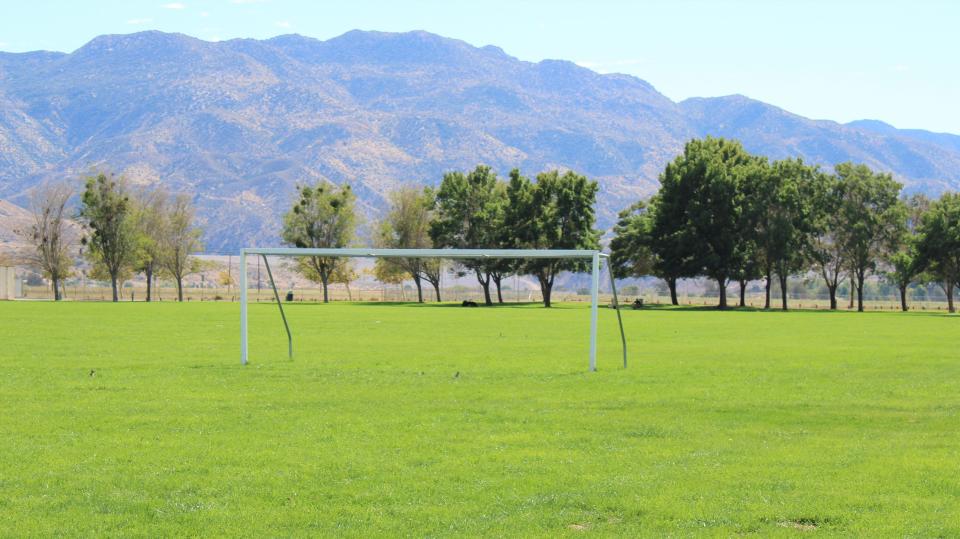 Large green soccer fields available for all  at Hesperia Lake Park.