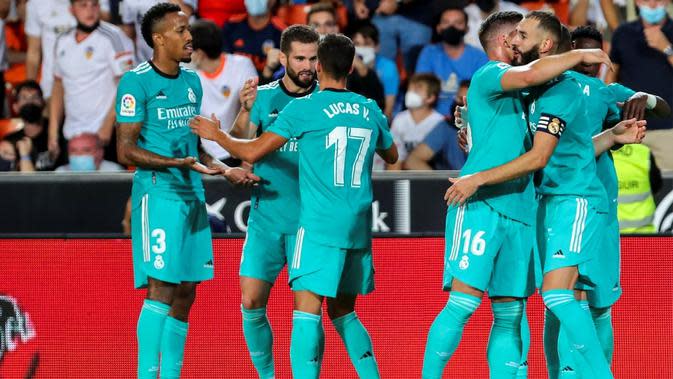 Real Madrid meraih kemenangan 2-1 atas Valencia pada laga pekan kelima La Liga di Estadio Mestalla, Senin (20/9/2021) dini hari WIB. (AP Photo/Alberto Saiz)