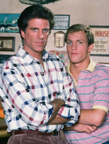 <p>NBCU Photo Bank/NBCUniversal via Getty</p> (L-R) Ted Danson as Sam Malone and Woody Harrelson as Woody Boyd in 'Cheers'