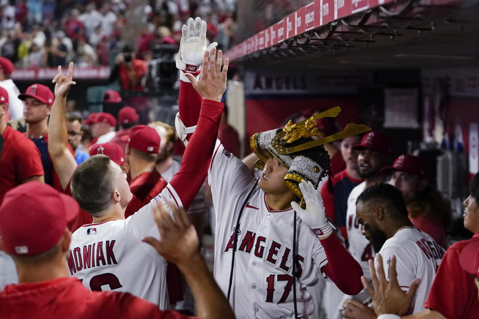 Shohei Ohtani's celebration was short-lived after he hit his 40th homer of the season. The Mariners rallied in the ninth to stun the Angels 5-3. (AP Photo/Ryan Sun)