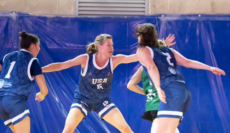 Carolyn Dorfman of Mamaroneck playing basketball at the Maccabi Pan-Am Games in Argentina in December. Carolyn played on the USA open team, and Addison played on the USA U18 team. When country's pulled out over security concerns, Addison's team was forced to play against adult teams, including playing against her mother.