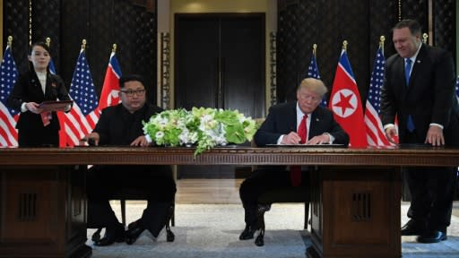 US Secretary of State Mike Pompeo stands by President Donald Trump during his first summit with North Korean leader Kim Jong Un in June 2018