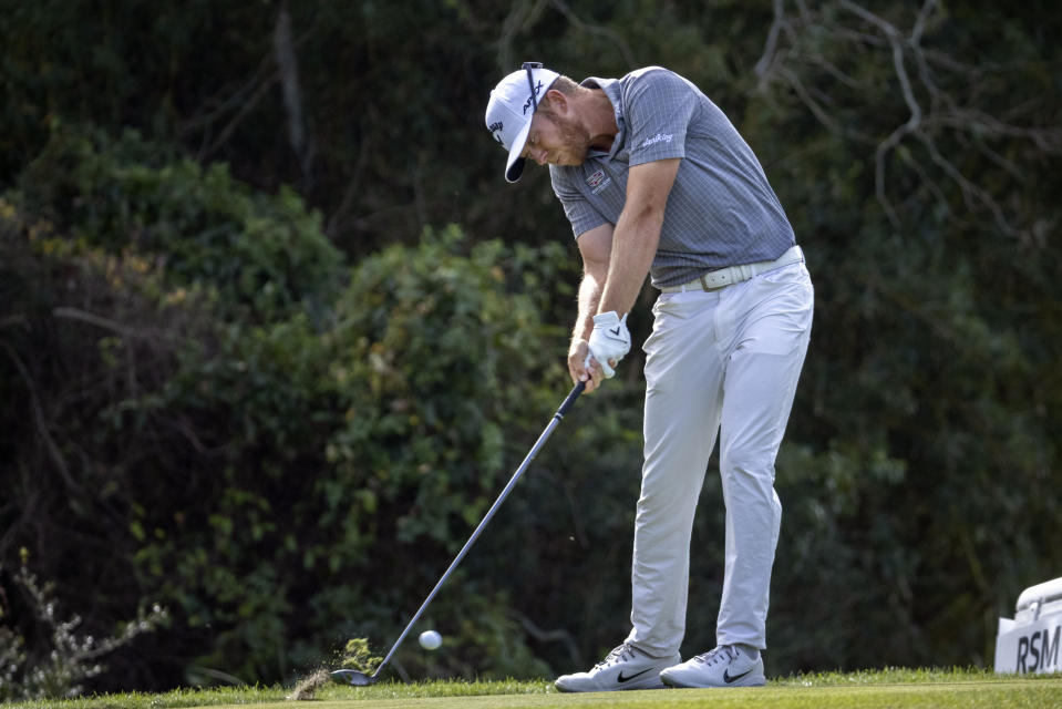 Talor Gooch strikes his ball on the second tee during the final round of the RSM Classic golf tournament, Sunday, Nov. 21, 2021, in St. Simons Island, Ga. (AP Photo/Stephen B. Morton)