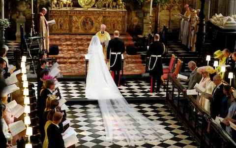 Prince Harry and Meghan Markle in St George's Chapel  - Credit: PA