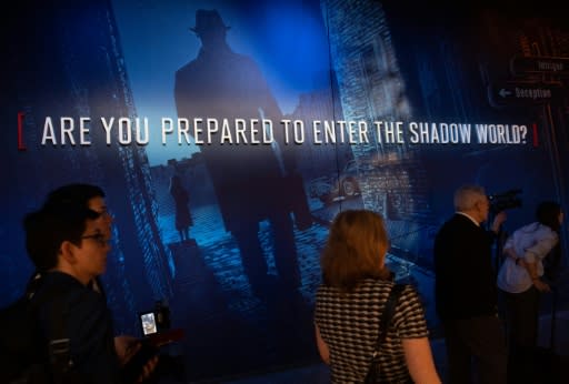Visitors tour the new International Spy Museum in Washington