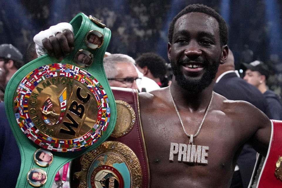 Terence Crawford celebrates his defeat of Errol Spence Jr. after their undisputed welterweight championship boxing match, Saturday, July 29, 2023, in Las Vegas. (AP Photo/John Locher)