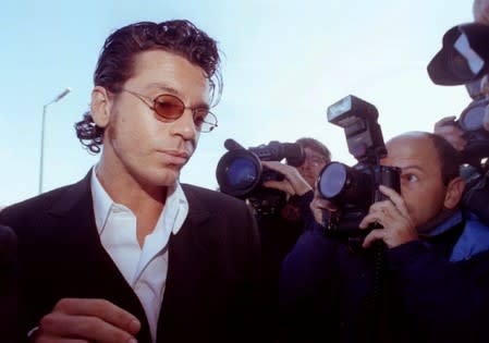 FILE PHOTO: Michael Hutchence, lead singer of the group INXS, arrives at Maidstone Magistrates Court