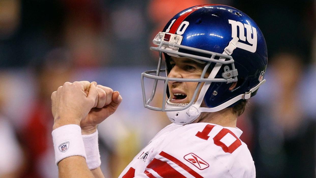 Mandatory Credit: Photo by Paul Sancya/AP/Shutterstock (9271978d)New York Giants quarterback Eli Manning reacts in the closing minutes of the NFL Super Bowl XLVI football game against the New England Patriots, in Indianapolis.