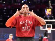 Feb 14, 2016; Toronto, Ontario, CAN; Western Conference forward Kobe Bryant of the Los Angeles Lakers (24) blows kisses before the NBA All Star Game at Air Canada Centre. Mandatory Credit: Bob Donnan-USA TODAY Sports