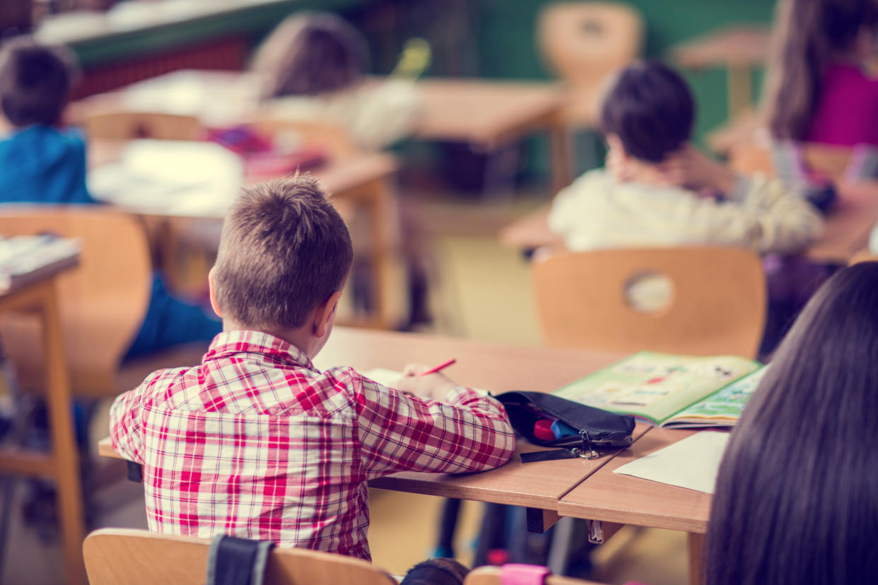 A schoolboy studying in the classroom. (Photo: Getty Images)