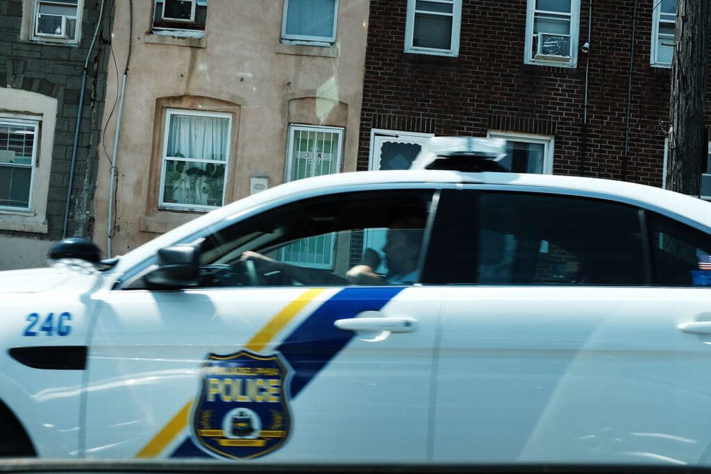 A police officer patrols in the Kensington section of Philadelphia on July 21, 2017 in Philadelphia, Pennsylvania. (Photo by Spencer Platt/Getty Images)