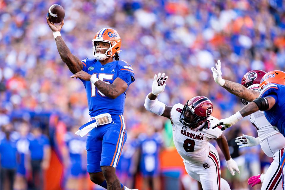 Florida Gators quarterback Anthony Richardson (15) throws the ball under pressure from South Carolina Gamecocks defensive back Cam Smith (9) during the first half at Steve Spurrier Field at Ben Hill Griffin Stadium in Gainesville, FL on Saturday, November 12, 2022.

Syndication The Clarion Ledger