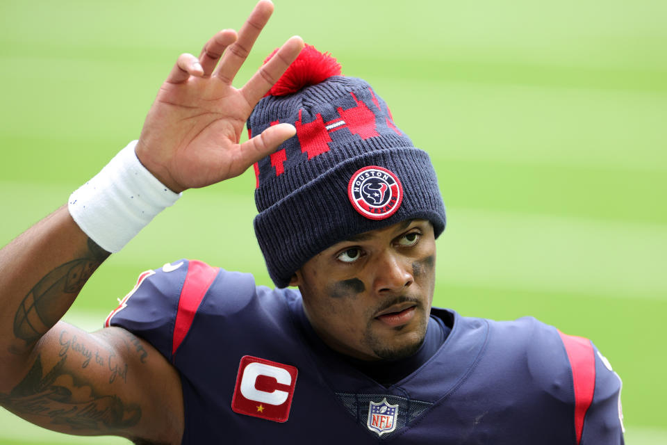 HOUSTON, TEXAS - DECEMBER 27: Quarterback Deshaun Watson #4 of the Houston Texans walks off the field after a 37-31 loss to the Cincinnati Bengals at NRG Stadium on December 27, 2020 in Houston, Texas. (Photo by Carmen Mandato/Getty Images)