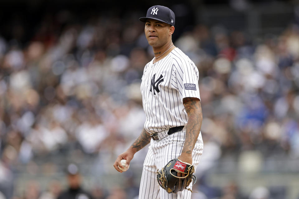 New York Yankees pitcher Luis Gil reacts after being called for a balk during the third inning of a baseball game against the Tampa Bay Rays, Sunday, April 21, 2024, in New York. (AP Photo/Adam Hunger)