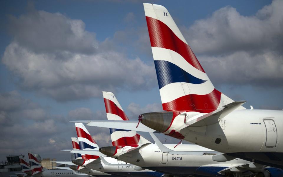 EMBARGOED TO 0001 MONDAY JANUARY 24 File photo dated 29/04/21 of a line of British Airways planes parked at London City Airport. Airlines will be forced to operate more flights this summer to avoid losing lucrative take-off and landing slots at the UK's busiest airports. They must use their slots at least 70% of the time to keep them from March 27, Transport Secretary Grant Shapps announced. Issue date: Monday January 24, 2022. PA Photo. See PA story AIR Slots . Photo credit should read: Victoria Jones/PA Wire - PA