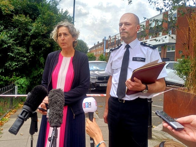 Detective Chief Superintendent James Conway, in charge of policing in Hackney and Hackney mayor Caroline Woodley speaking to the media near to the scene in Stellman Close