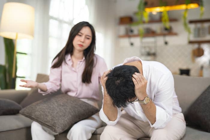 a couple fighting inside their home