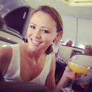 Celebrity photos: After her long stint in Shrek The Musical, Kimberley Walsh is now jetting off on holiday with her Girls Aloud bandmate Nicola Roberts. The pair are heading off to Las Vegas, and Nicola shared this photo of Kimberley sipping a cocktail on the plane. Well jel. Copyright [Nicola Roberts]