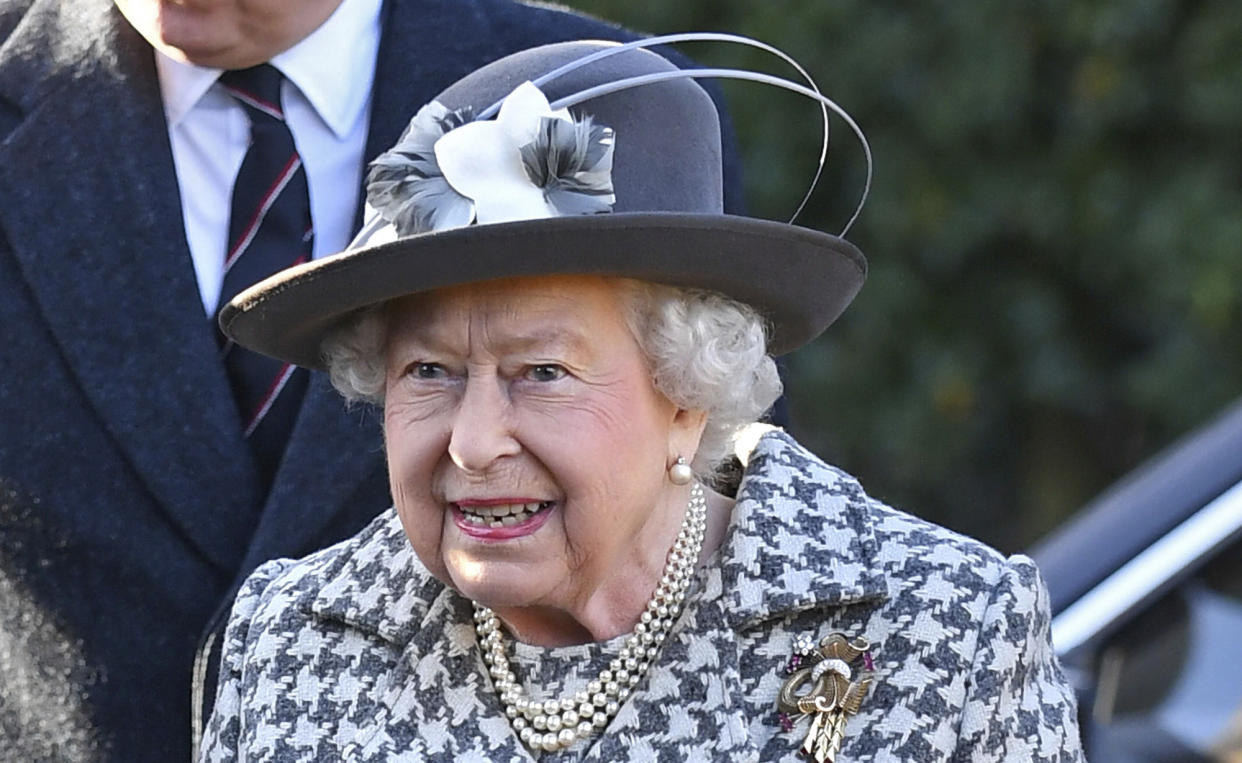 Britain's Queen Elizabeth II arrives at St Mary the Virgin, in Hillington, England, to attend a Sunday church service, Sunday, Jan. 19, 2020. Buckingham Palace says Prince Harry and his wife, Meghan, will no longer use the titles "royal highness" or receive public funds for their work under a deal that allows them to step aside as senior royals.  (Joe Giddens/PA via AP)