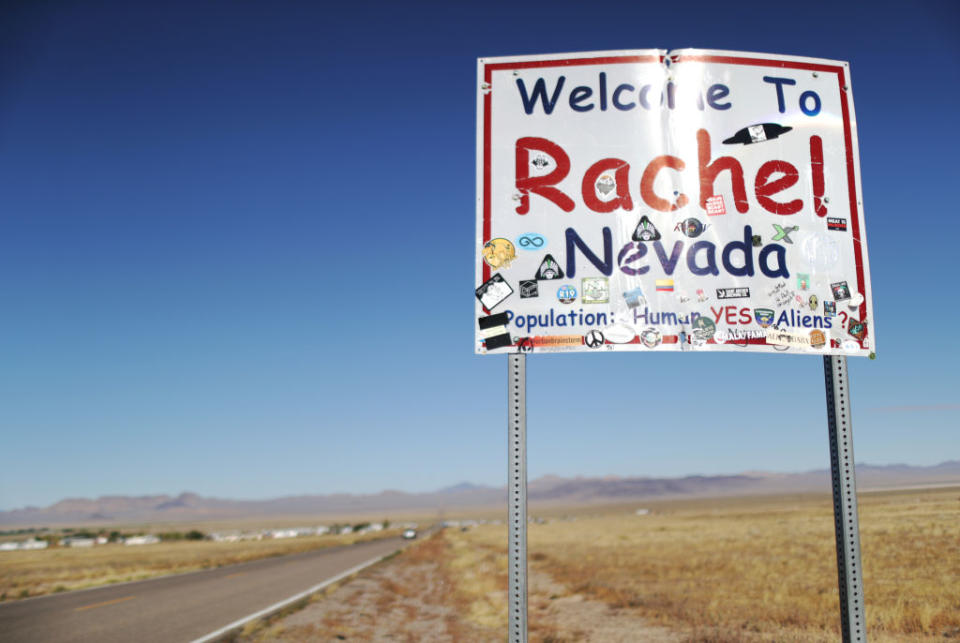 A town sign is posted, mentioning aliens, during the 'Storm Area 51' spinoff event 'Alienstock' on September 21, 2019 in Rachel, Nevada. | Mario Tama—Getty Images