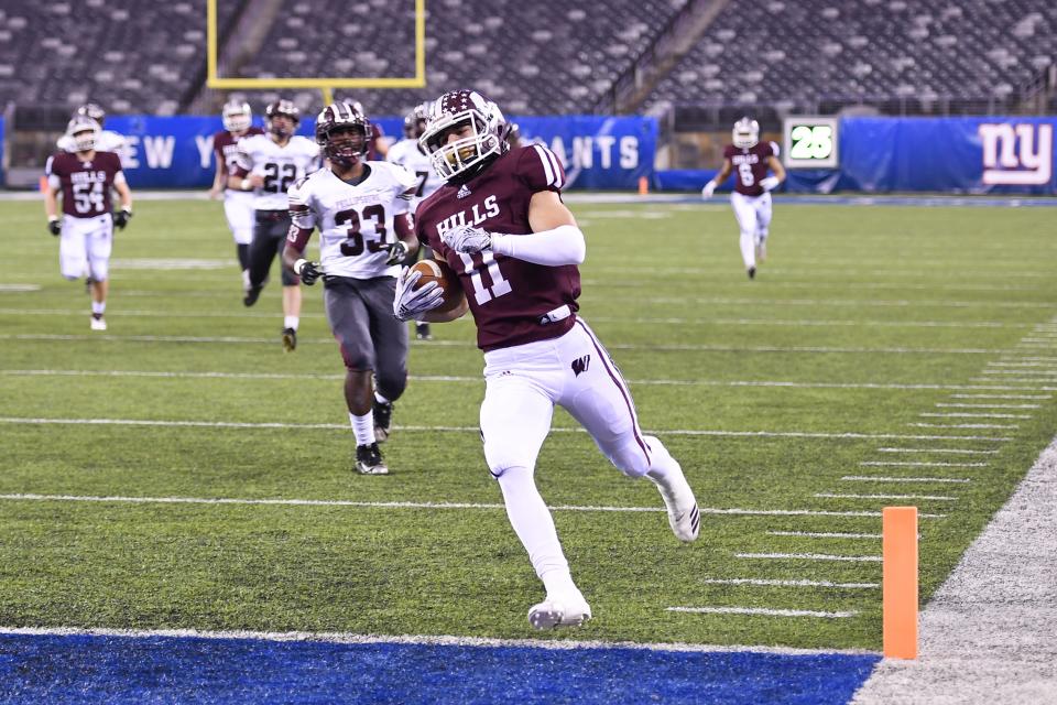 Wayne Hills football vs. Phillipsburg in North Group 4 Bowl Game at MetLife Stadium in East Rutherford on Friday, November 30, 2018. WH #11 Jaaron Hayek scores a touchdown in the first quarter.