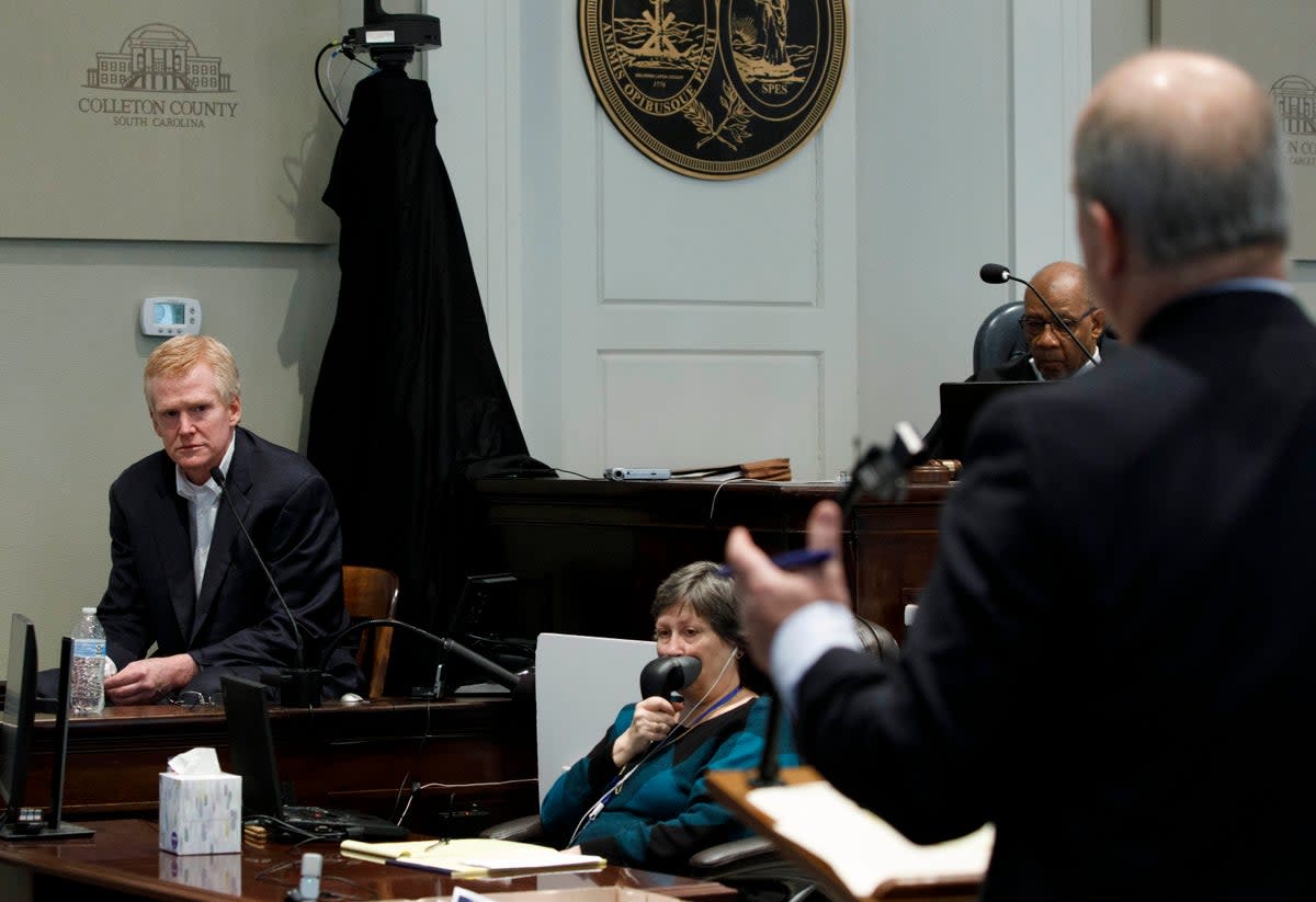 Defense attorney Jim Griffin, right, questions Alex Murdaugh, left, as he gives testimony during his murder trial at the Colleton County Courthouse in Walterboro, South Carolina (AP)