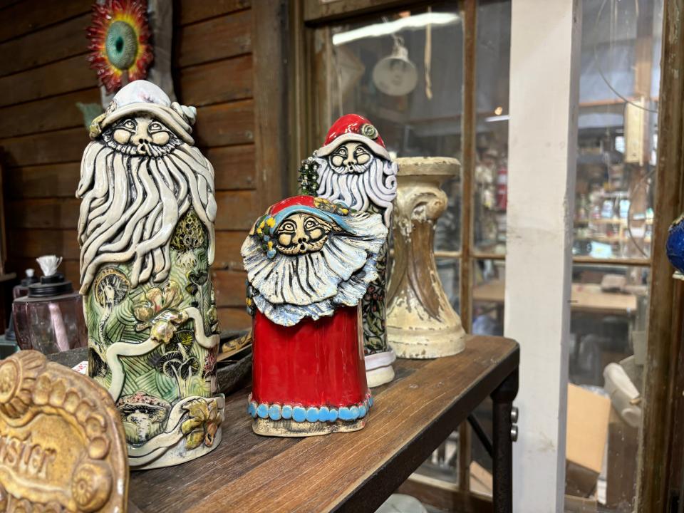 Ceramic Santas made by Merry Pickenpaugh in Pickenpaugh Pottery and Gallery.