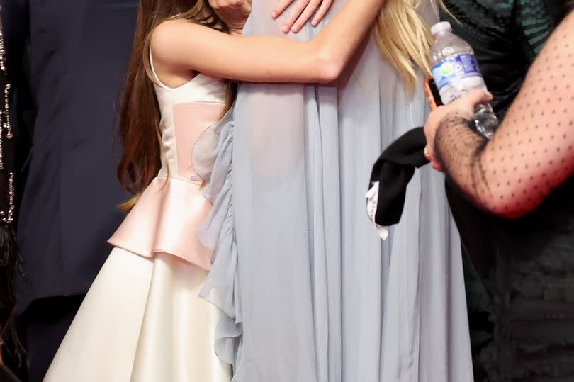 Sienna hugs daughter Marlowe on red carpet in Cannes