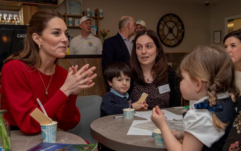 EMBARGOED TO 0001 FRIDAY NOVEMBER 27 File photo dated 04/02/20 of the Duchess of Cambridge, meeting local mums and carers during a visit to Joe's Ice Cream Parlour on Mumbles Road, near Swansea in south Wales to hear about life in the Mumbles and talk about her landmark survey on the early years. The Duchess is to warn of the crucial role early years play in raising the next generation of adults and shaping society, as her landmark research on the issue is published. PA Photo. Issue date: Friday November 27, 2020. Kate has been the driving force behind the study â€“ the largest of its kind in the UK on perceptions of early childhood â€“ which reports that only one in four people recognise the key importance of the first five years of a child's life. More than half-a-million people took part in the Royal Foundation's "five big questions on the under-fives" poll which was carried out by Ipsos MORI and produced the largest-ever response from the public to a survey of its kind. See PA story ROYAL Kate. Photo credit should read: Arthur Edwards/The Sun/PA Wire - Arthur Edwards/The Sun/PA Wire